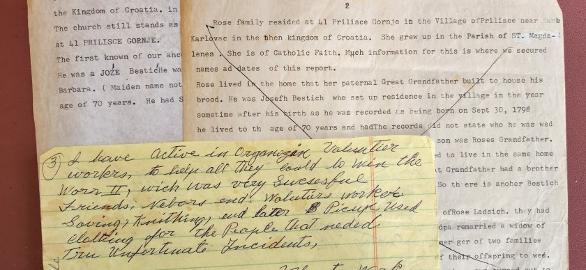 A close-up of yellowed paper documents with handwritten notes and typed text, detailing information about a family history related to Rose and her ancestry in Croatia.
